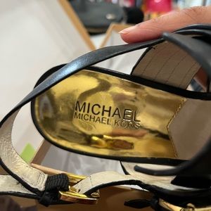 Michael Kors 1” heel only worn once.  Black leather straps.